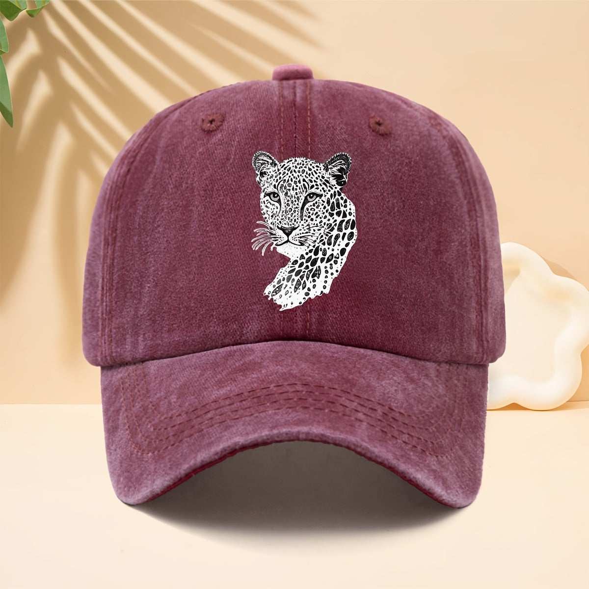 A Trendy Baseball Cap with a Black and White Leopard Head Illustration Print, Featuring a Soft Crown and Curved Brim. This Classic Snapback Hat Is an Adjustable Casual Cap Suitable for All Seasons. It's a Six-panel Trucker Hat, a Matching Couple's