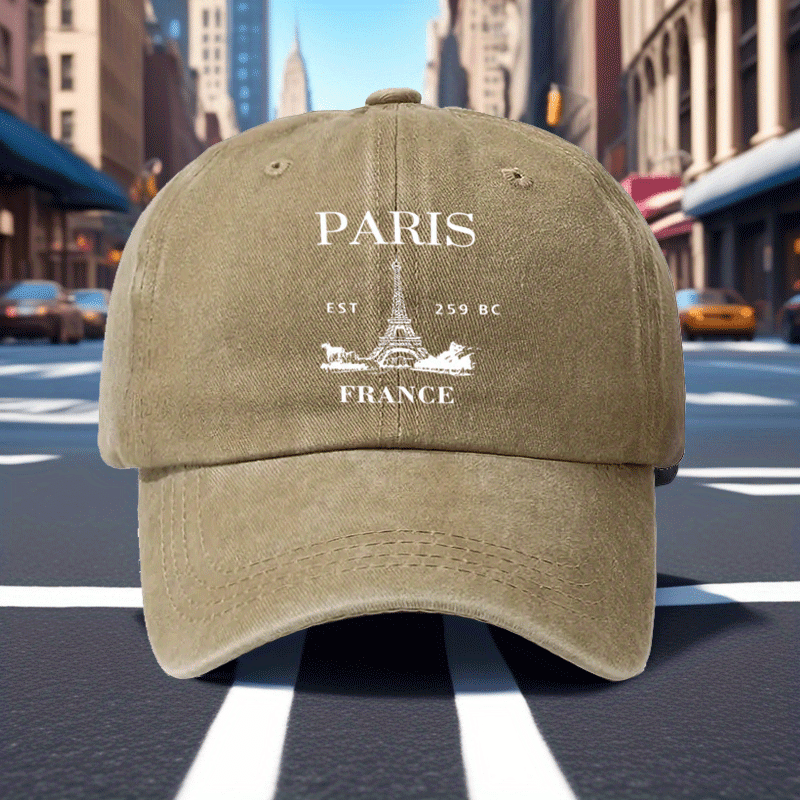 A Retro Baseball Cap Featuring a Print of The Eiffel Tower in Paris, Designed with a Relaxed Curved Brim And Soft Top, Adjustable for a Comfortable Fit, Perfect for Sports, And Stylish with a Pointed Top