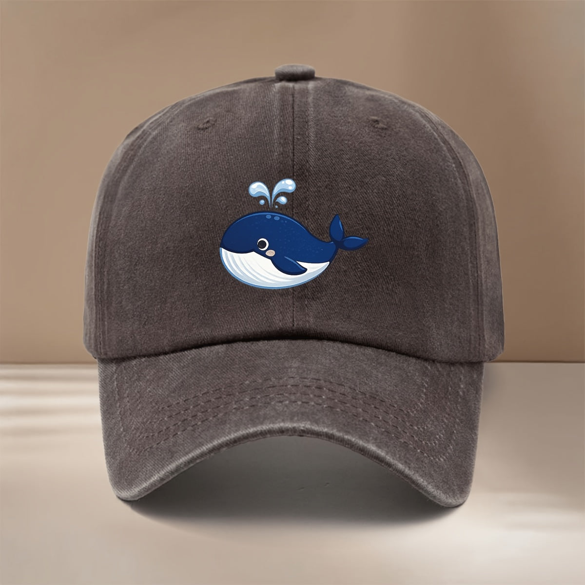 This Is a Baseball Cap with a Whale Spouting Water Graphic Print. It Is a , Lightweight, and Adjustable Casual Hat Suitable for Both Men and Women. This Stylish and Trendy Snapback Cap Is Perfect for Outdoor Sports, Dinners, Camping, and Other
