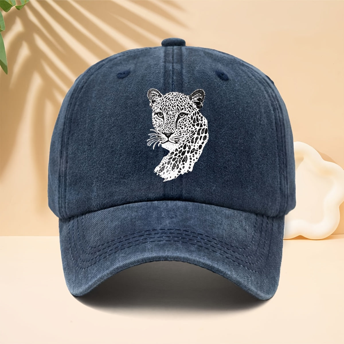 A Trendy Baseball Cap with a Black and White Leopard Head Illustration Print, Featuring a Soft Crown and Curved Brim. This Classic Snapback Hat Is an Adjustable Casual Cap Suitable for All Seasons. It's a Six-panel Trucker Hat, a Matching Couple's