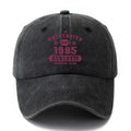 A Unisex Fashionable and Versatile Printed UNIVERSITY 1985 Baseball Cap, Featuring a Classic Vintage Washed Outdoor Lightweight Curved Brim. This Trucker Baseball Cap Is Suitable for Casual Occasions Such as Outdoor Vacations, Travel, and Camping