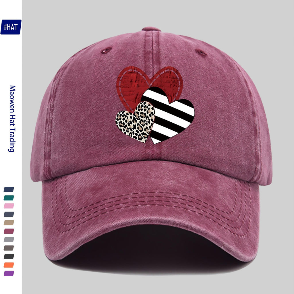 A Washed Baseball Cap with Iron-on Transfer Designs of Red Hearts, Black Striped Hearts, Leopard Print Hearts, and Crossed Hearts. It Features a New Autumn/winter Vintage Style, Is Unisex, Adjustable in Size, Lightweight, and Suitable for Outdoor Use
