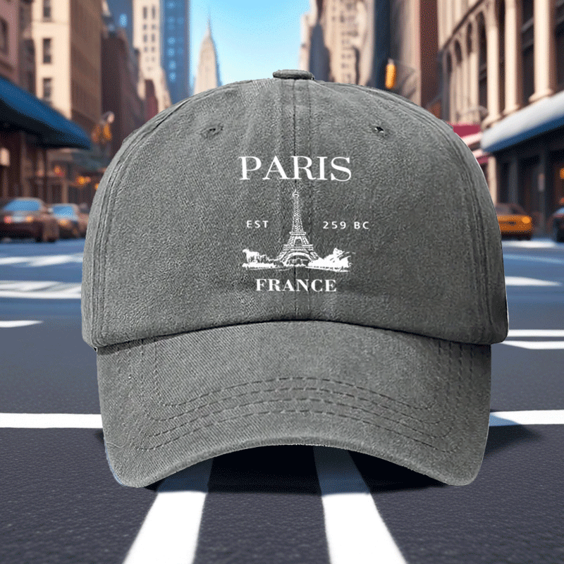 A Retro Baseball Cap Featuring a Print of The Eiffel Tower in Paris, Designed with a Relaxed Curved Brim And Soft Top, Adjustable for a Comfortable Fit, Perfect for Sports, And Stylish with a Pointed Top