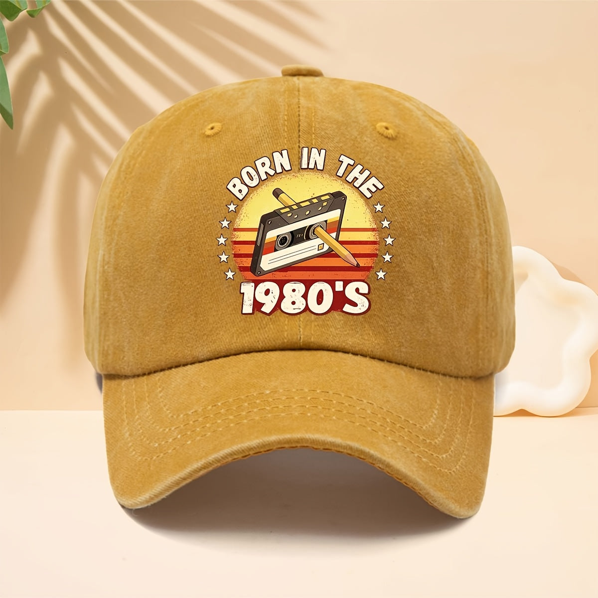 A Washed Baseball Cap with the Print "BORN IN THE 1980S". This Versatile Trucker Hat Features a Soft Crown and Curved Brim for a Comfortable Fit That Conforms to the Head. Its Relaxed, Street-style Design Is Adjustable and Suitable for Both Men