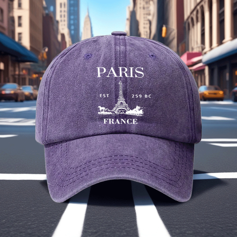 A Retro Baseball Cap Featuring a Print of The Eiffel Tower in Paris, Designed with a Relaxed Curved Brim And Soft Top, Adjustable for a Comfortable Fit, Perfect for Sports, And Stylish with a Pointed Top
