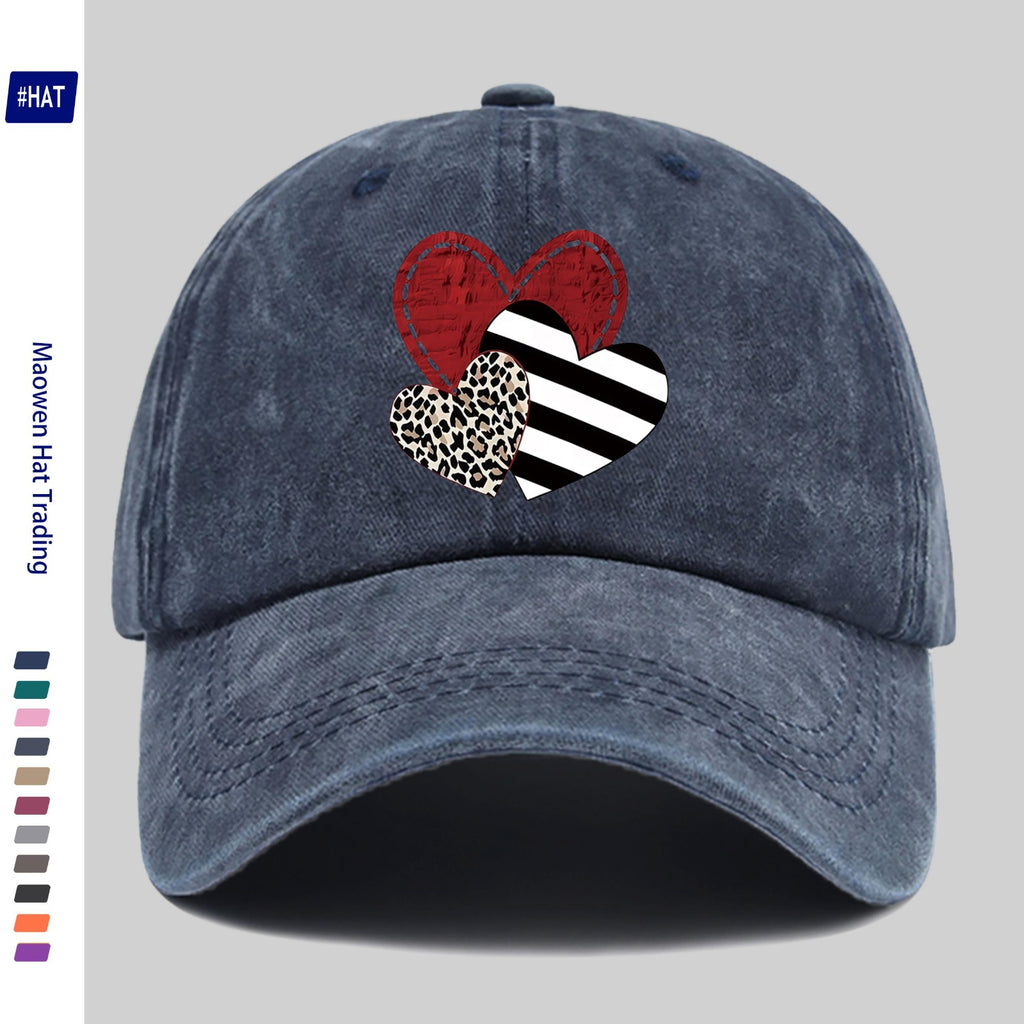 A Washed Baseball Cap with Iron-on Transfer Designs of Red Hearts, Black Striped Hearts, Leopard Print Hearts, and Crossed Hearts. It Features a New Autumn/winter Vintage Style, Is Unisex, Adjustable in Size, Lightweight, and Suitable for Outdoor Use