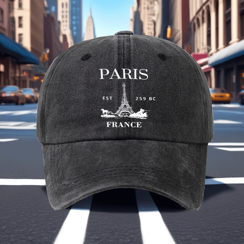 A Retro Baseball Cap Featuring a Print of The Eiffel Tower in Paris, Designed with a Relaxed Curved Brim And Soft Top, Adjustable for a Comfortable Fit, Perfect for Sports, And Stylish with a Pointed Top