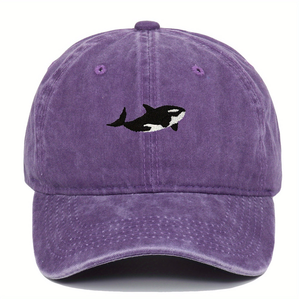 A versatile novelty washed baseball cap with whale embroidery pattern, adjustable for both men and women