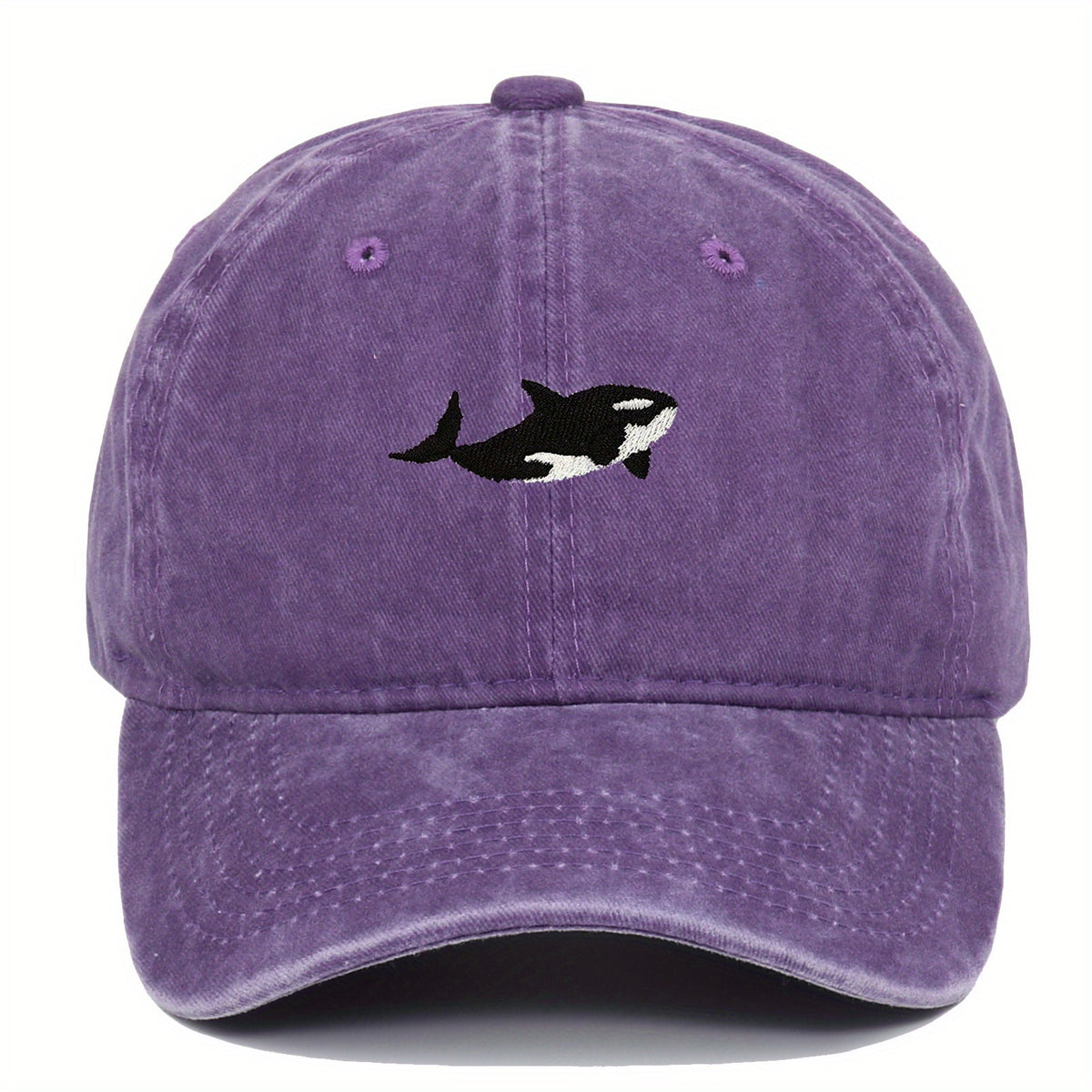 A versatile novelty washed baseball cap with whale embroidery pattern, adjustable for both men and women