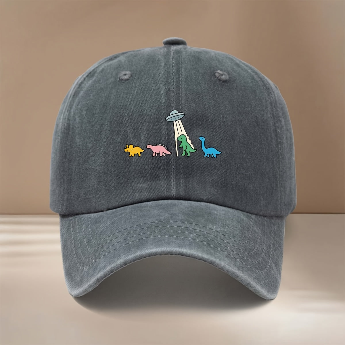 This Is a Baseball Cap with a Dinosaur and UFO Print, Suitable for All Seasons. It Features an Adjustable Size, a Curved Brim, and Is Unisex. The Hat Is Comfortable, Lightweight, and Can Be Worn for Outdoor Sports, Dinners, Camping, or as a  Fashion