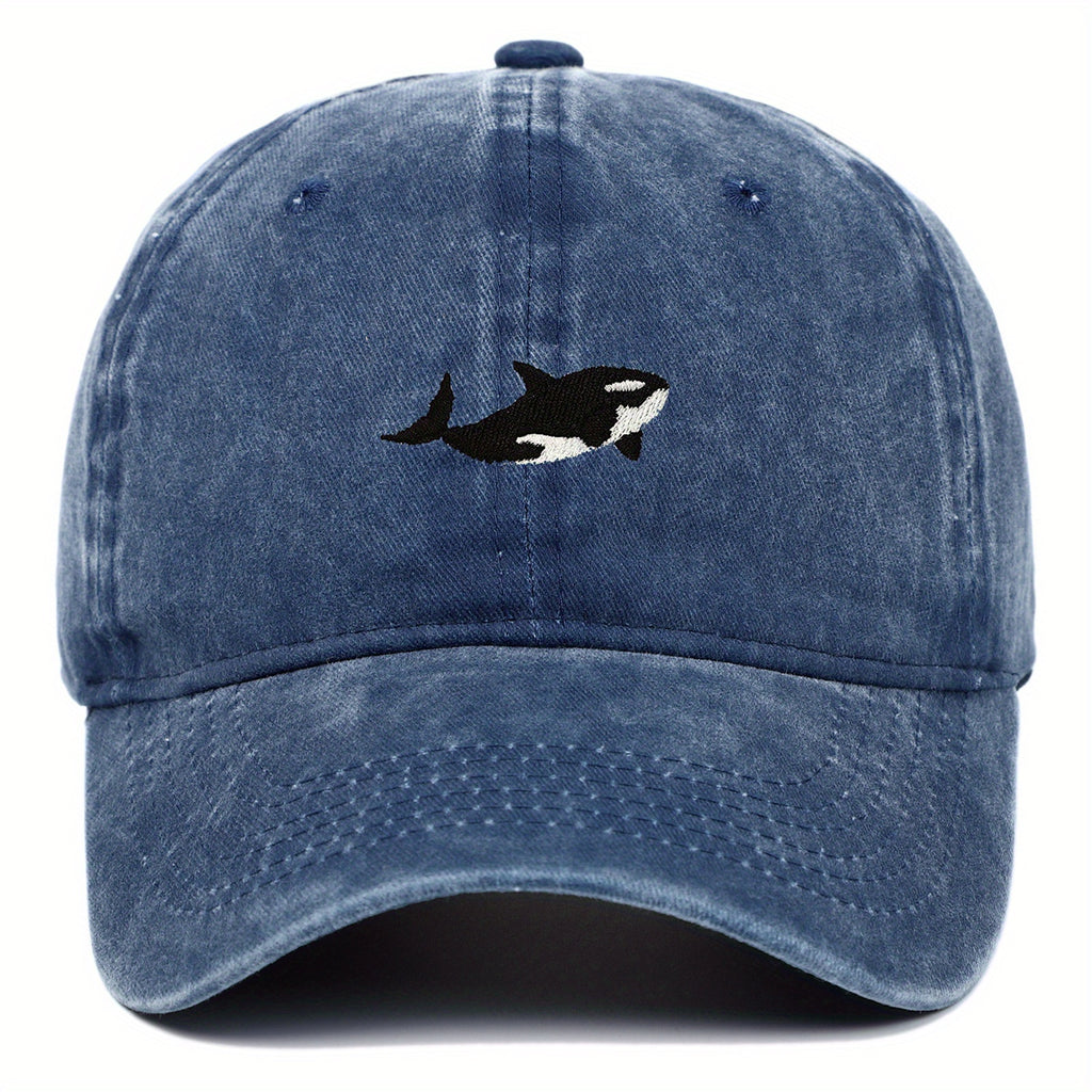 A versatile novelty washed baseball cap with whale embroidery pattern, adjustable for both men and women