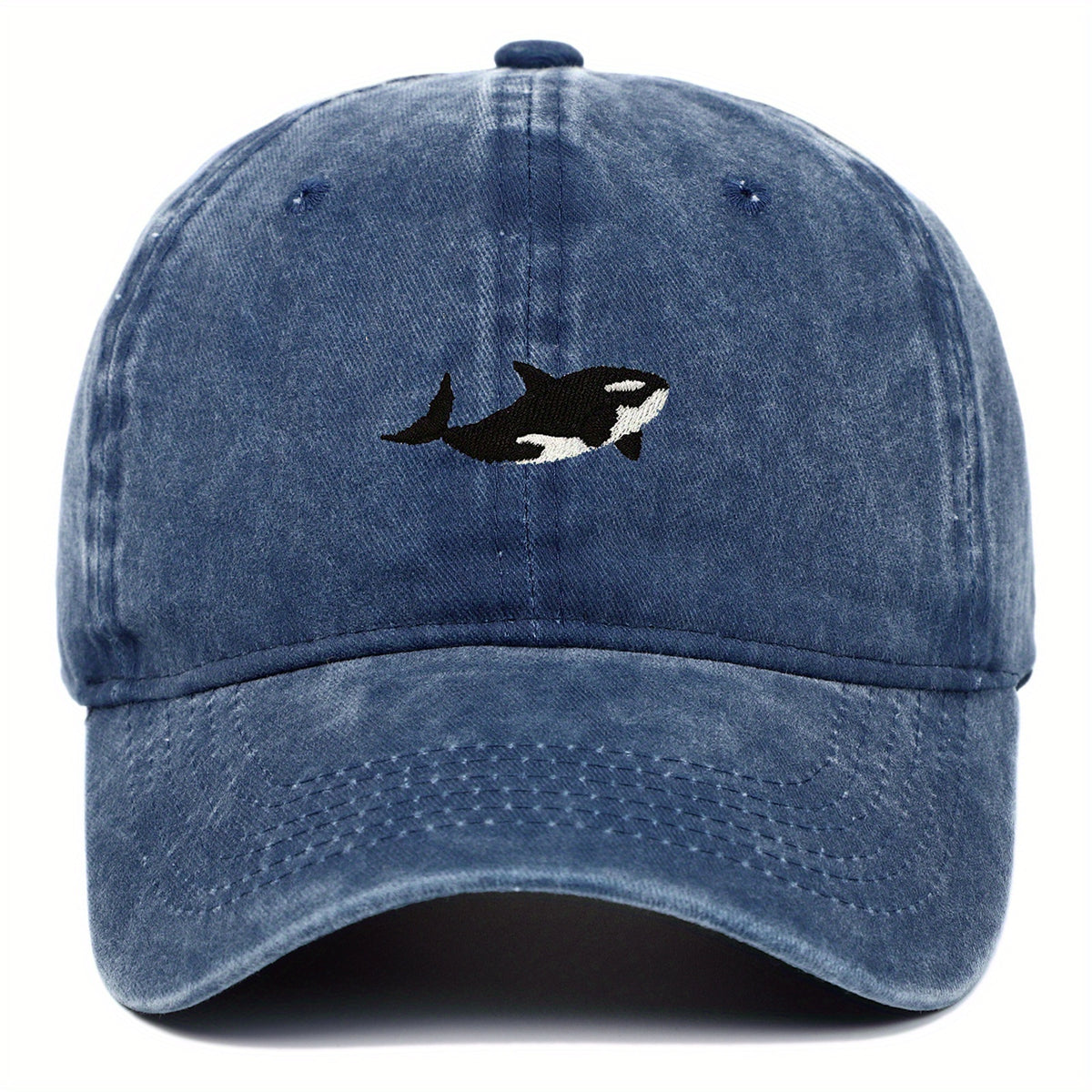 A versatile novelty washed baseball cap with whale embroidery pattern, adjustable for both men and women
