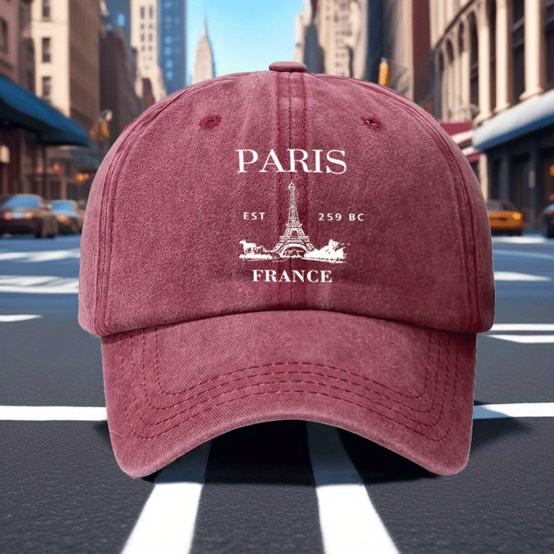 A Retro Baseball Cap Featuring a Print of The Eiffel Tower in Paris, Designed with a Relaxed Curved Brim And Soft Top, Adjustable for a Comfortable Fit, Perfect for Sports, And Stylish with a Pointed Top