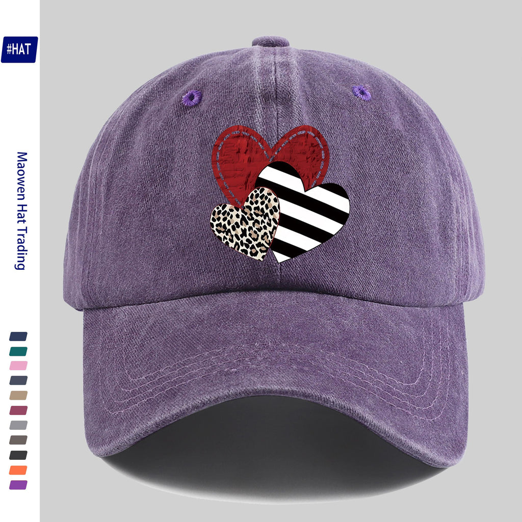 A Washed Baseball Cap with Iron-on Transfer Designs of Red Hearts, Black Striped Hearts, Leopard Print Hearts, and Crossed Hearts. It Features a New Autumn/winter Vintage Style, Is Unisex, Adjustable in Size, Lightweight, and Suitable for Outdoor Use