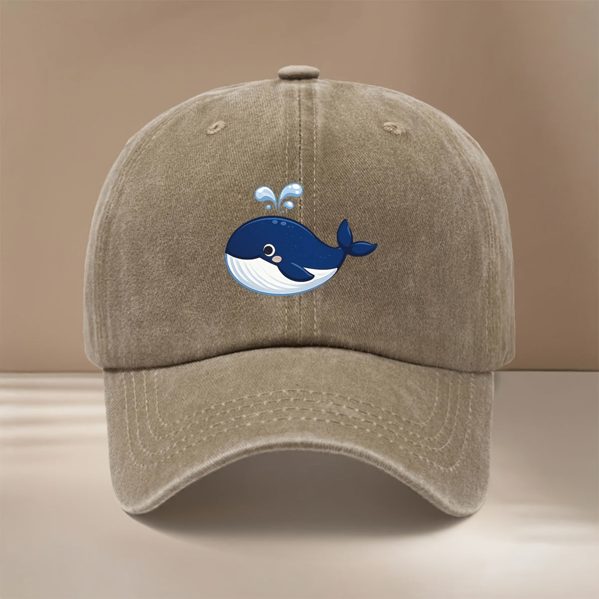 This Is a Baseball Cap with a Whale Spouting Water Graphic Print. It Is a , Lightweight, and Adjustable Casual Hat Suitable for Both Men and Women. This Stylish and Trendy Snapback Cap Is Perfect for Outdoor Sports, Dinners, Camping, and Other